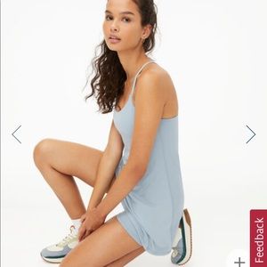 BLACK ACTIVE DRESS solid black color NOT in the blue as pictured. NEVER WORN